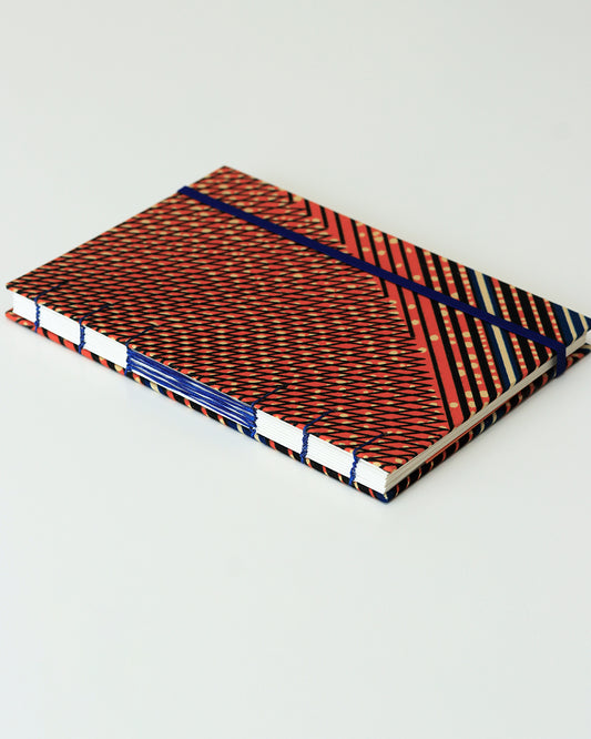 Quaderno A5 wax africano arancioni righe blu e pois beige (elastico e busta)