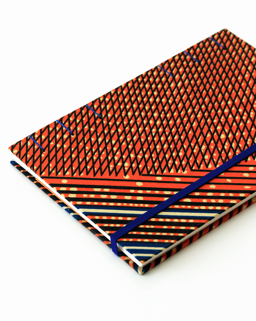 Quaderno A5 wax africano arancioni righe blu e pois beige (elastico e busta)