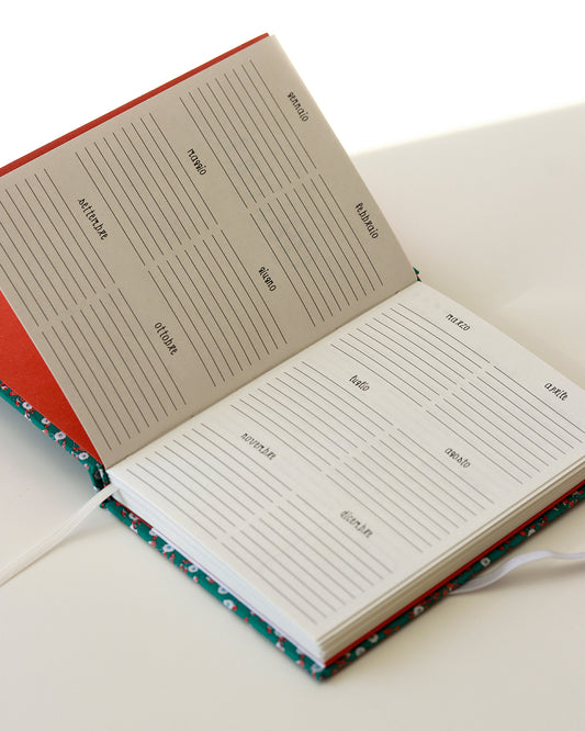 Agenda tascabile perpetua A6, fiorellini bianchi e arancioni su verde (con tasca interna)