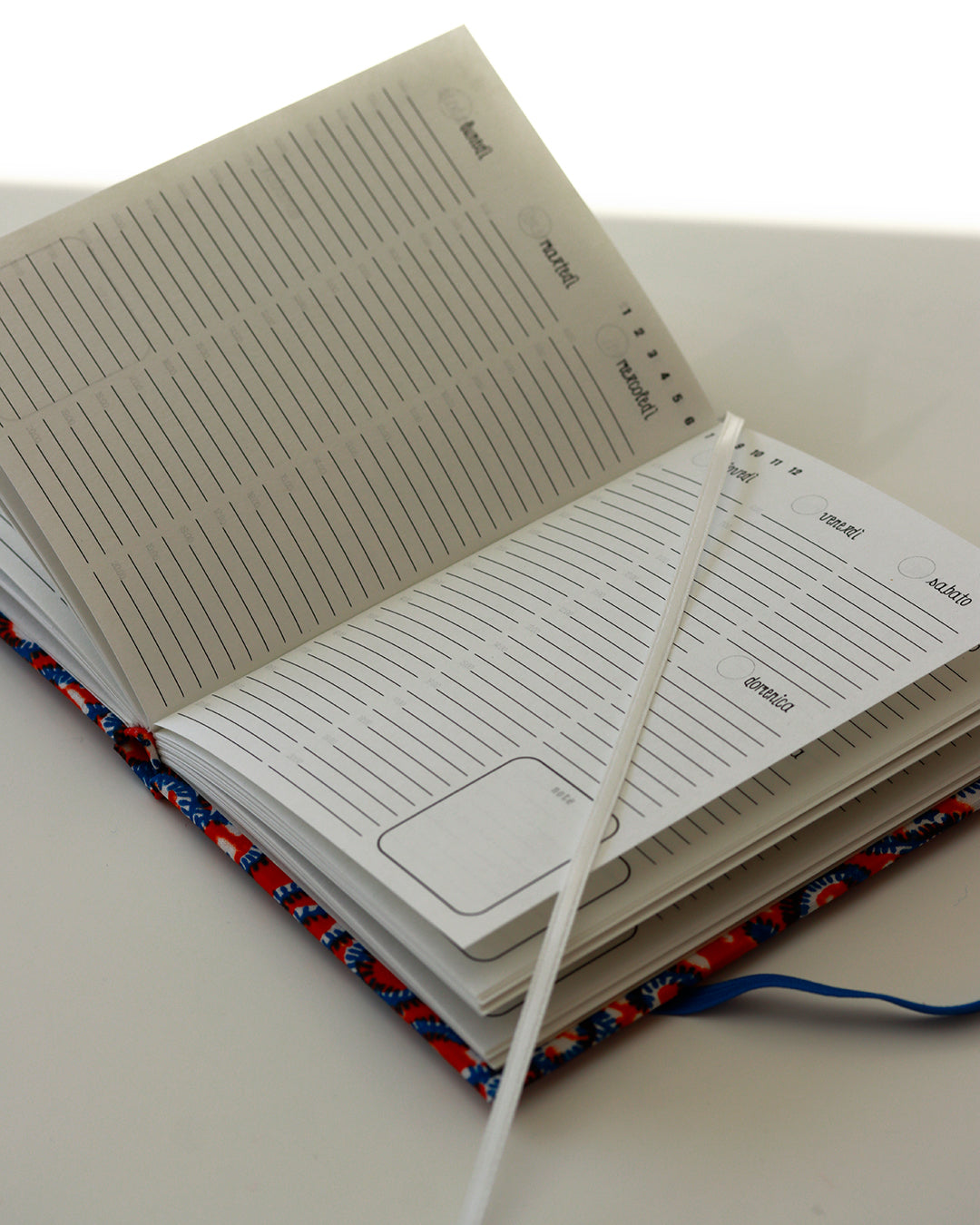 Agenda tascabile perpetua A6, wax africano arancione e blu