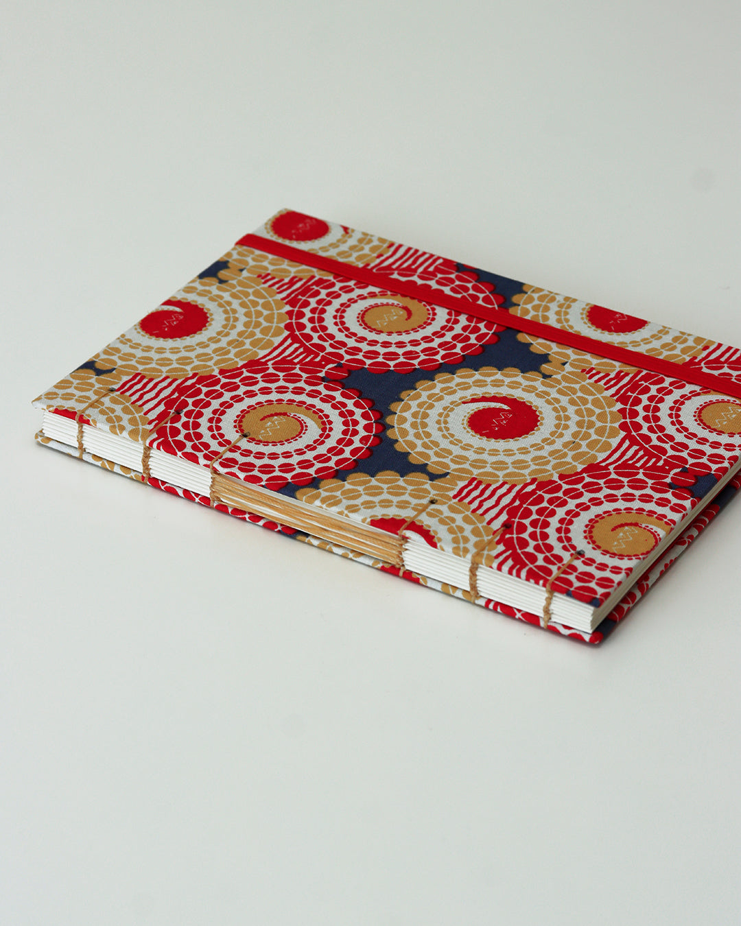 Quaderno A5 wax africano cerchi rosso e beige (elastico e busta)