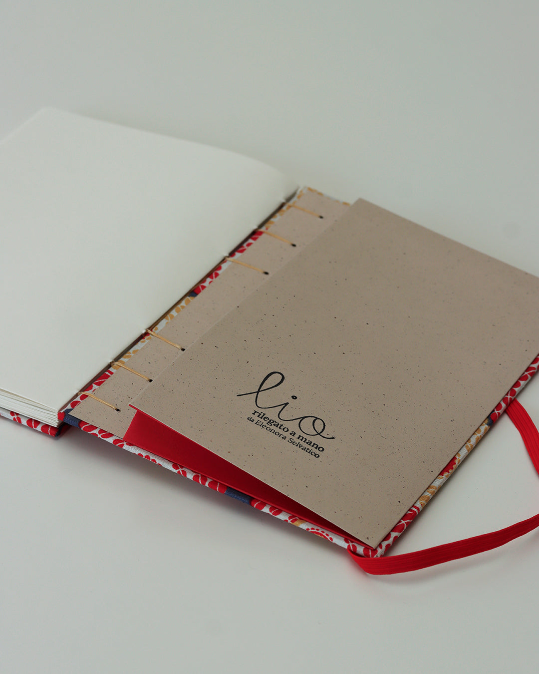 Quaderno A5 wax africano cerchi rosso e beige (elastico e busta)