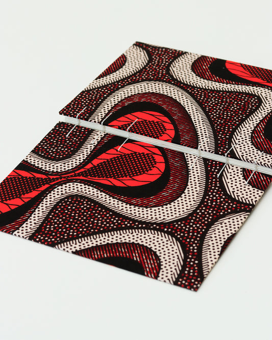 Quaderno A5 wax africano pois bianco, arancione e bordeaux