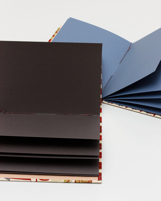 Album medio fotografia | cucitura esposta sul dorso rigido | villaggio natalizio