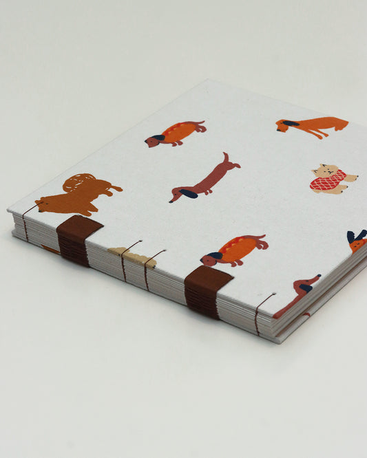 Quaderno guestbook quadrato con carta di birra rivestito con tessuto a cagnolini