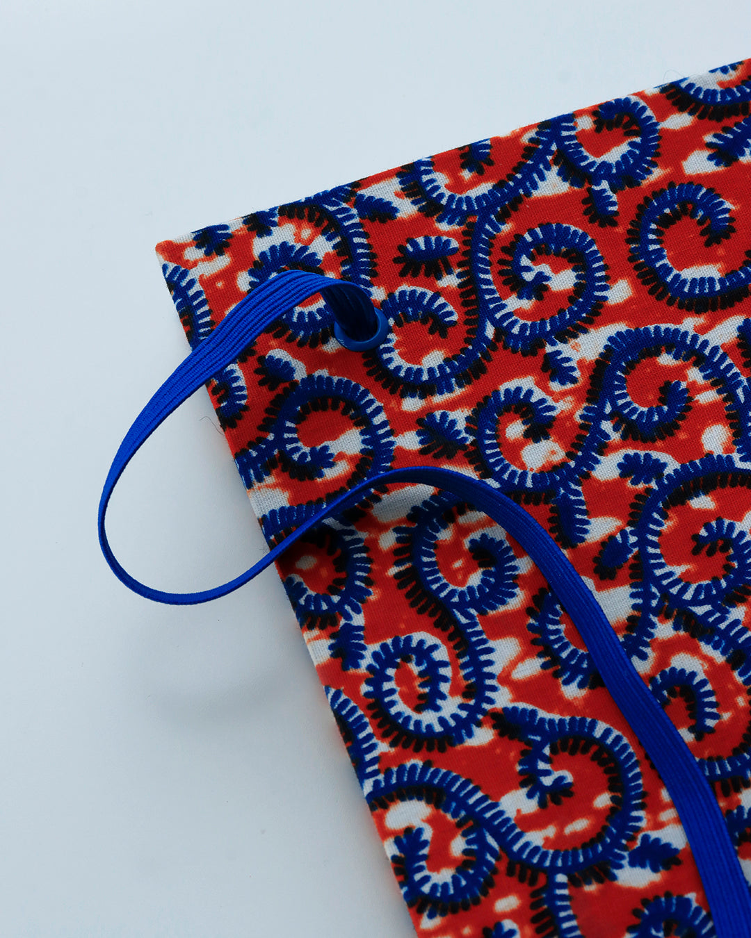 Quaderno A5 wax africano pattern ondulato arancione e azzurro (elastico e busta)