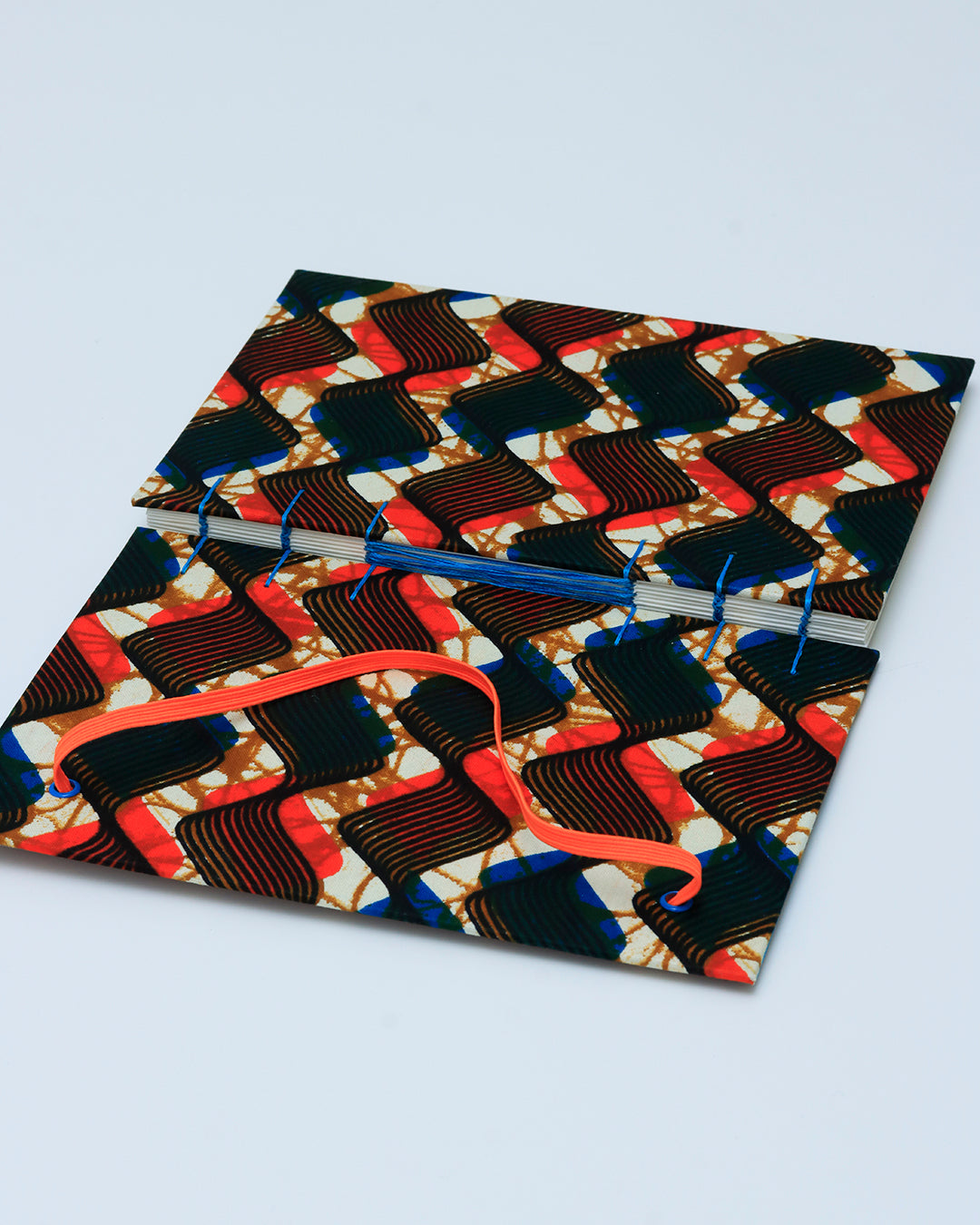 Quaderno A5 wax africano onde arancione e blu (elastico e busta)