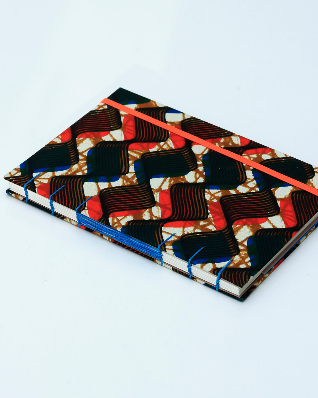 Quaderno A5 wax africano onde arancione e blu (elastico e busta)