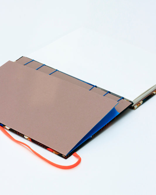 Quaderno A5 wax africano onde arancione e blu (elastico e busta)