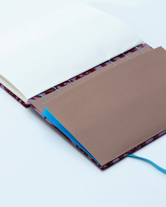 Quaderno A5 wax africano sole viola e bordeaux (elastico e busta)