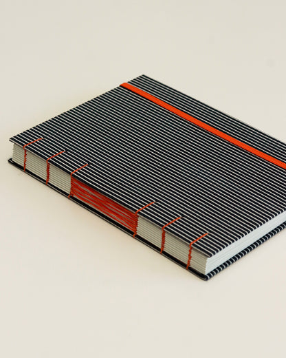 Agenda 2026 rigata (mix copta e francese con elastico)