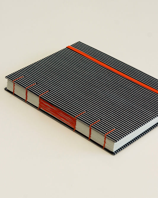 Agenda 2026 rigata (mix copta e francese con elastico)