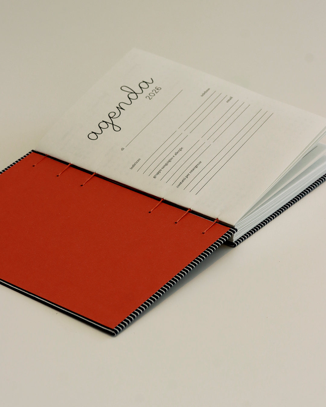 Agenda 2026 rigata (mix copta e francese con elastico)