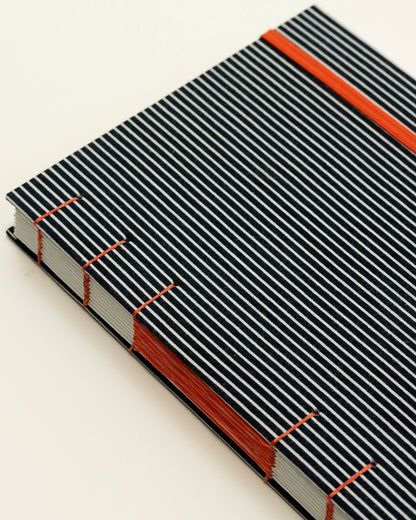 Agenda 2026 rigata (mix copta e francese con elastico)