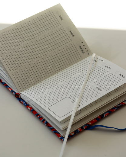 Agenda tascabile perpetua A6, wax africano arancione e blu