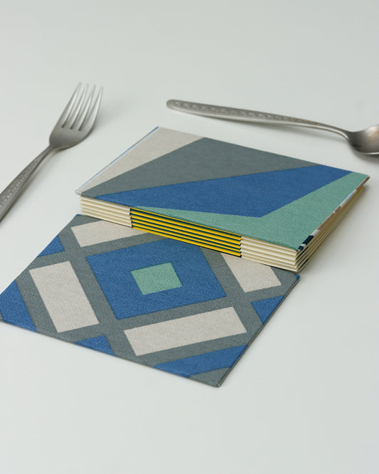 Ricettario formato A6, carta agrumi, rilegatura australiana, piastrelle colorate blu, grigio, verde acqua e bianco