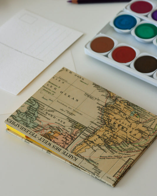 Album cartoline (illustrate) con mappa vintage rete telegrafica mondiale e principali rotte di navigazione