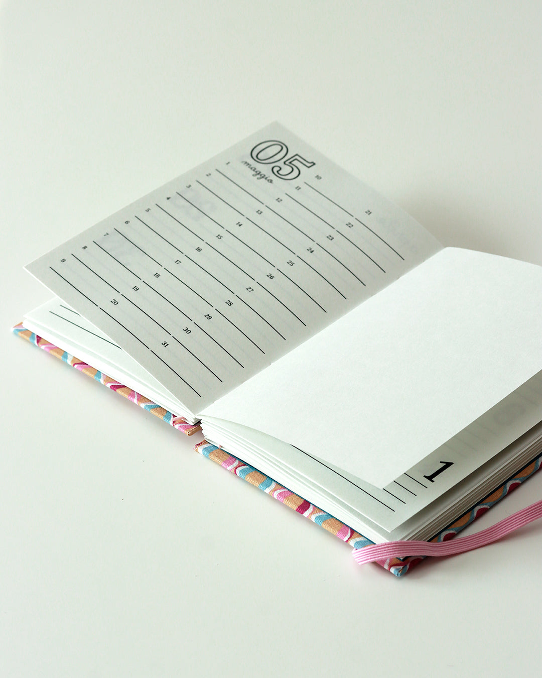 Agenda delle ricorrenze righe ondulate rosa (mix-copta francese con elastico)