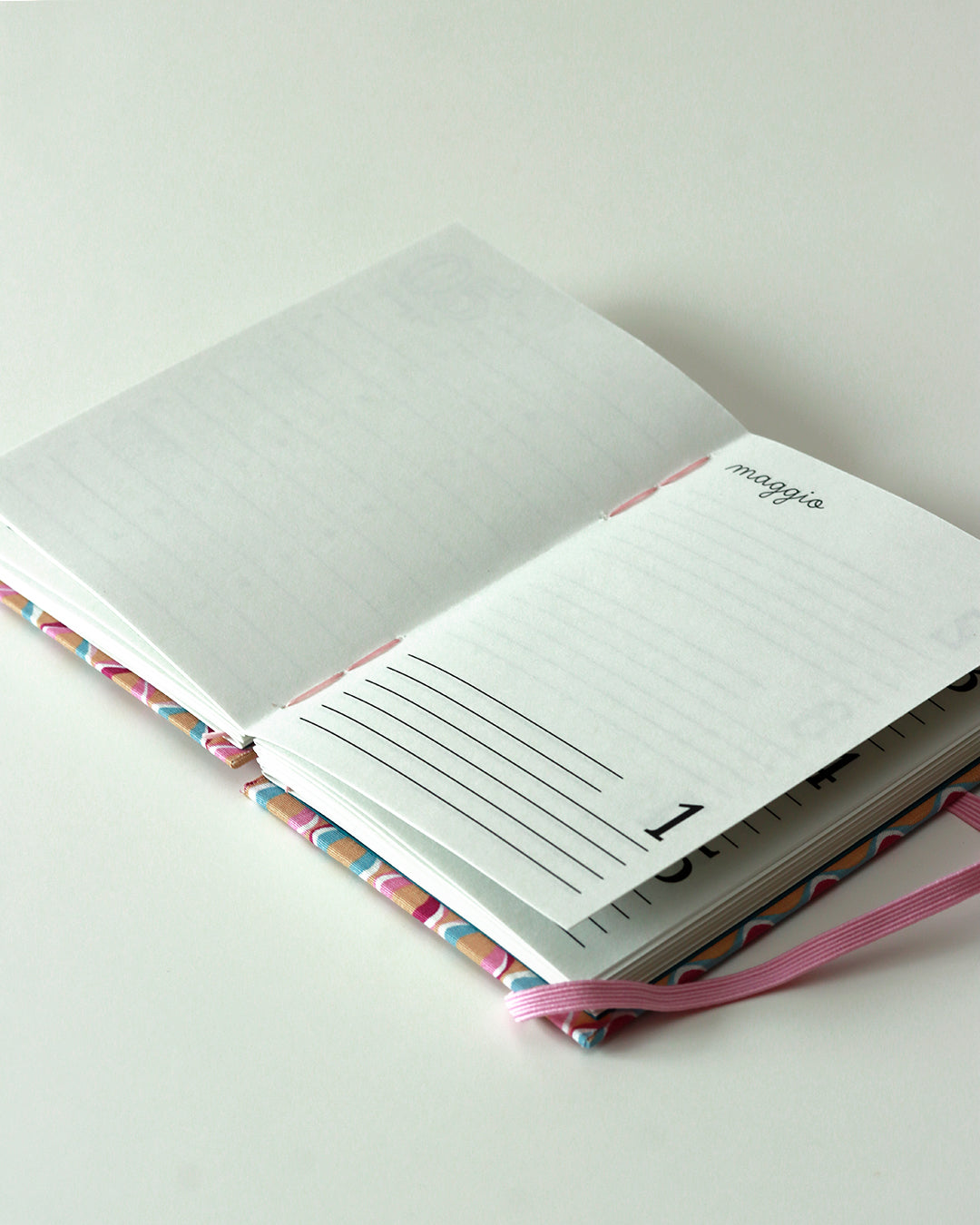 Agenda delle ricorrenze righe ondulate rosa (mix-copta francese con elastico)