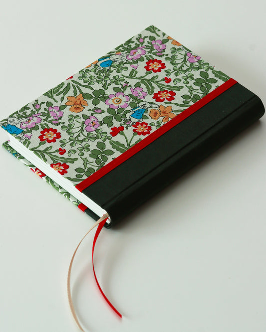 Agenda delle ricorrenze coniglietti tra narcisi e primule (dorso arrotondato)