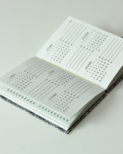 Agendina 2026 fiorellini grigi (copta con elastico)