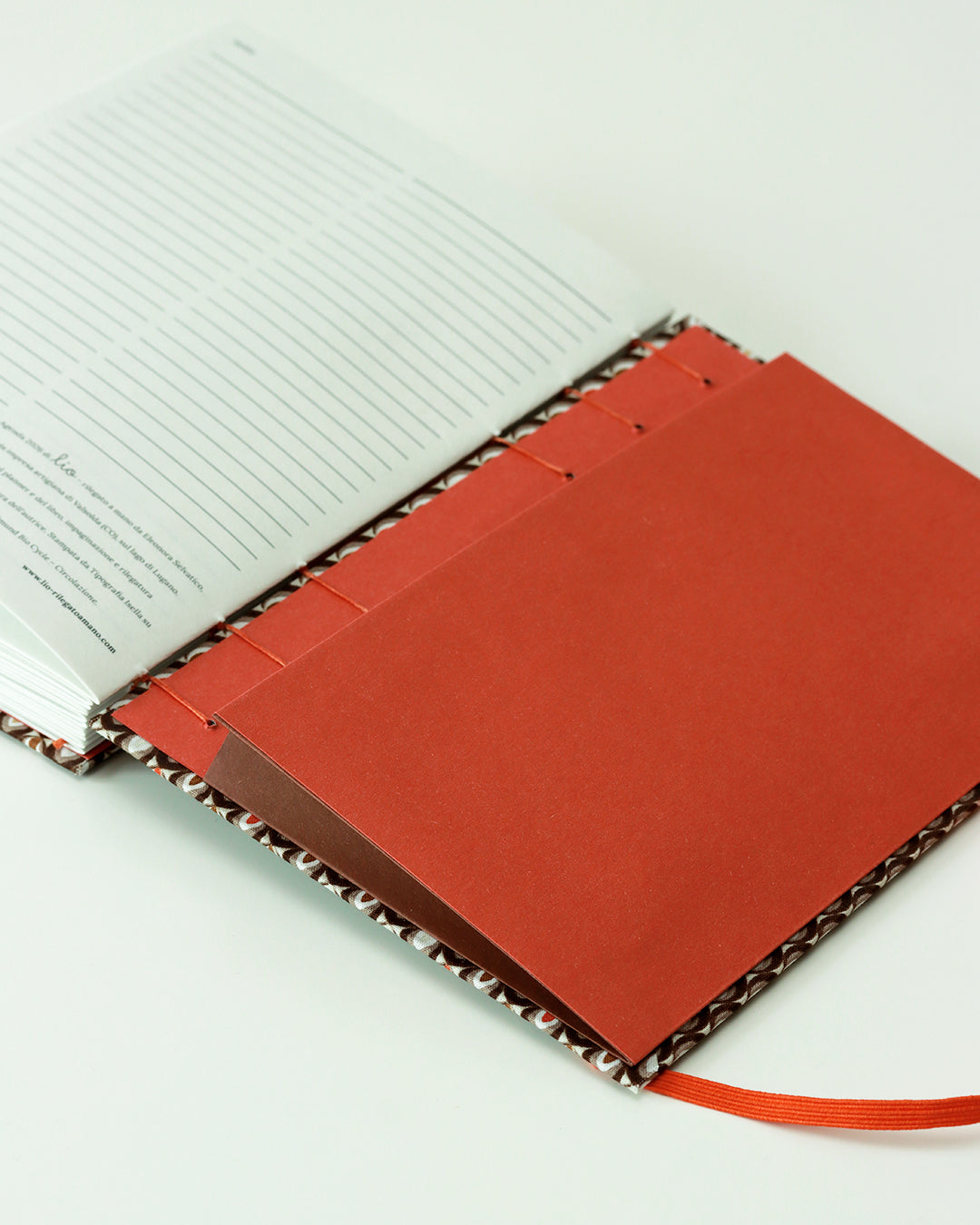 Agenda 2026 foglioline marroni e arancione (mix copta-francese con elastico e busta)