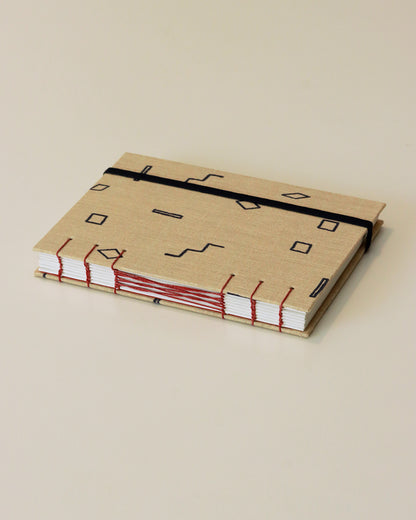 Agendina 2026 geometria minimale (mix copta-francese con elastico)