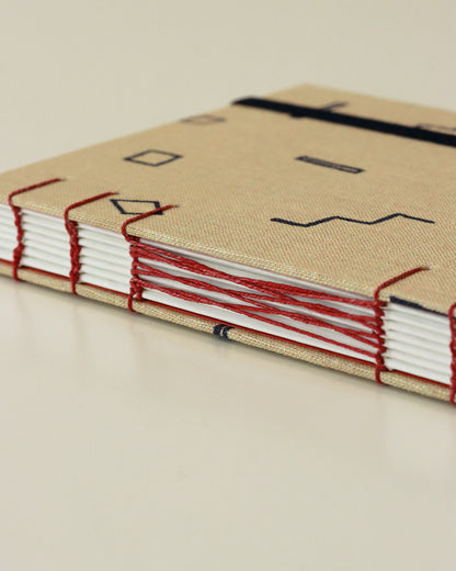 Agendina 2026 geometria minimale (mix copta-francese con elastico)