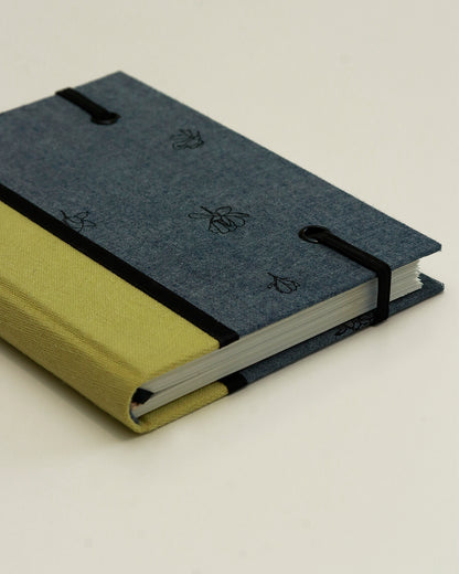 Agendina 2026 magnolie (dorso arrotondato con elastico, busta e pagine bianche extra)