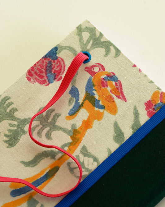 Agendina 2026 floreale verde con uccellino (dorso arrotondato con elastico e pagine bianche extra)