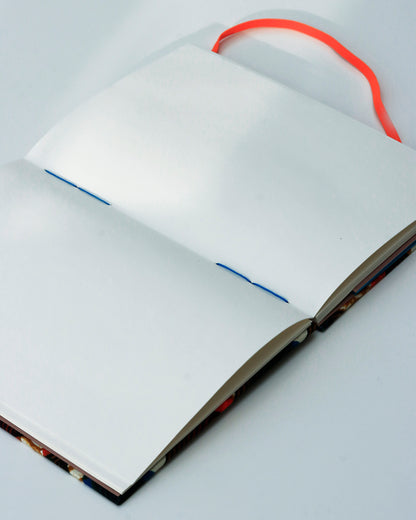 Quaderno A5 wax africano onde arancione e blu (elastico e busta)