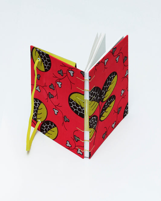 Quaderno A5 wax africano foglie fucsia e giallo (elastico e busta)